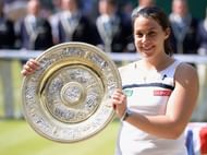 Marion Bartoli with the 2013 Wimbledon women's singles trophy